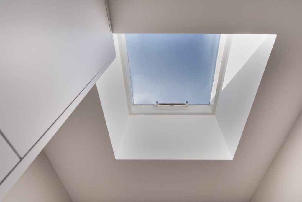 Flat roof skylight above a single storey house extension